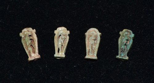 AN ANCIENT EGYPTIAN OPEN WORK AMULET GROUP