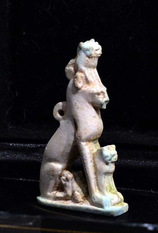 AN EGYPTIAN FAIENCE SEATED CAT WITH KITTENS AMULET, Ex. SOTHEBYS, NY