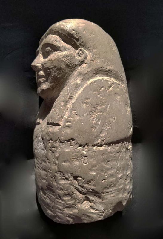 AN ANCIENT EGYPTIAN LIMESTONE FALSE CANOPIC JAR