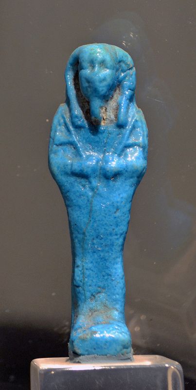 AN ANCIENT EGYPTIAN BLUE FAIENCE SHABTI