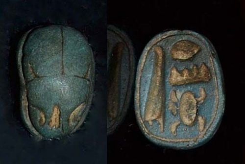 AN ANCIENT EGYPTIAN BLUE PASTE SCARAB