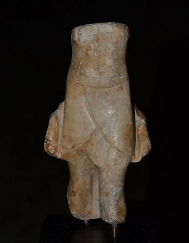 AN ANCIENT EGYPTIAN ALABASTER FIGURE OF A MAN