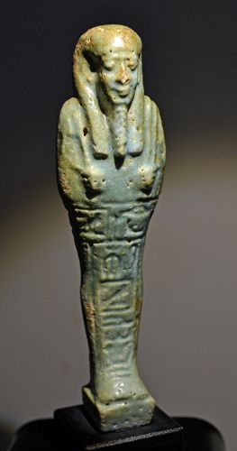 AN ANCIENT EGYPTIAN FAIENCE SHABTI FOR  HATHOR-EM-ACHET