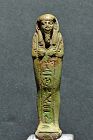 AN ANCIENT EGYPTIAN FAIENCE SHABTI FOR PSAMTIK