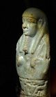 AN ANCIENT EGYPTIAN FAIENCE SHABTI