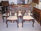 Eight Heavily Carved Mahogany Dining Room Chairs