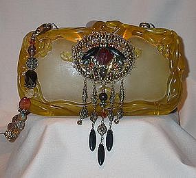 CARVED GOLDEN PURSE BY MAYA