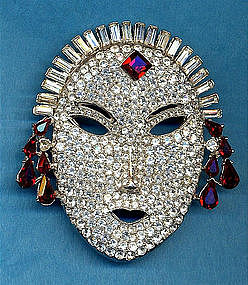 BUTLER AND WILSON MASK BROOCH