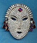 BUTLER AND WILSON MASK BROOCH