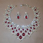 LAWRENCE VRBA DRAMATIC BIB NECKLACE AND CLIP EARRINGS