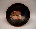 A Rare Song Black Glazed Conical Bowl With Leaf