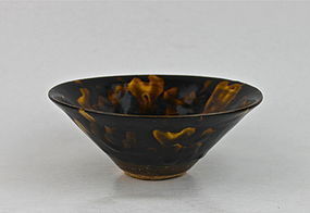 A TORTOISE SHELL EFFECT CONICAL TEA-BOWL (JIZHOU WARE)