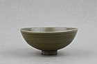 A YUAN DYNASTY CELADON TEA-BOWL