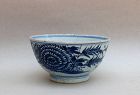 A BLUE AND WHITE BOWL WITH A CHRYSANTHEMUM