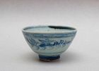 A MING DYNASTY BLUE AND WHITE TEA-BOWL