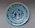 A MING DYNASTY BLUE AND WHITE DISH WITH A LADY FIGURE