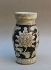 A SONG DYNASTY CIZHOU WARE WITH WHITE ON BLACK VASE