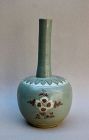 A DEFINITELY RARE COPPER RED SPOTTED CELADON LONG NECK VASE