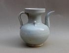 A WHITE GLAZE EWER WITH PAIR OF RING HANDLES TO THE SHOULDER