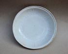 MING DYNASTY WHITE GLAZED KRAAK DISH WITH MOLDED INCISED DESIGN