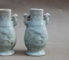 EXTREMELY RARE PAIR OF QINGBAI WITH DRAGONS AND PHOENIX HANDLES