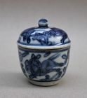 BLUE AND WHITE COVERED BOWL WITH HORSES AMONG FLORAL PATTERN