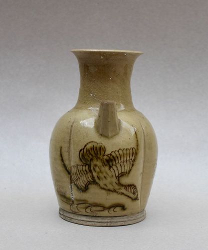A RARE PALE BROWN EWER WITH LOBED BODY AND BIRD ON FLIGHT