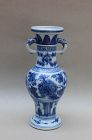 A MING DYNASTY BLUE AND WHITE ALTAR VASE
