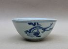 A LATE MING BLUE AND WHITE BOWL WITH SEA-DRAGON