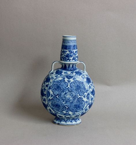 A RARE BLUE AND WHITE MOON FLASK WITH FLORAL DESIGN