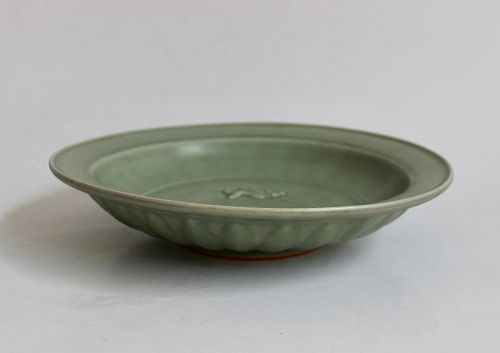 A CELADON DISH WITH MOLDED TWIN FISH SONG OR LATER