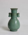 A SOUTHERN SONG DYNASTY LONGQUAN GUAN VASE WiTH TUBULAR HANDLES