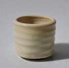 AN IVORY WHITE GLAZED TRIPOD CENSER