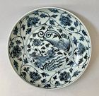 EXTRAORDINARY BLUE AND WHITE DISH WITH PHOENIX"S AMONG CHRYSANTHEMUMS