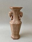 A RARE HEXAGONAL REDDISH GLAZED VASE WITH ELEPHANT EARS