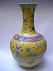 YELLOW GROUND FAMILLE ROSE BOTTLE VASE