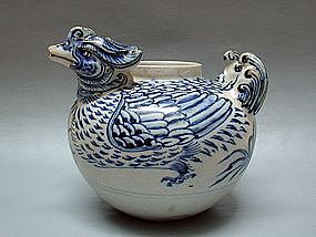 A RARE MUSEUM PIECE DOUBLE HEADED M-DUCK WATER DROPPER