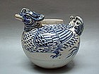 A RARE MUSEUM PIECE DOUBLE HEADED M-DUCK WATER DROPPER