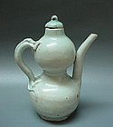 A Yuan Dynasty Double Gourd Ewer With Sea Dragon Handle