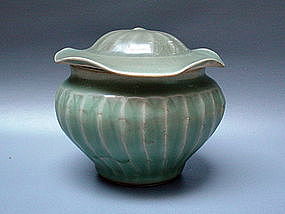 A Rare Celadon Fluted Sides Jar With Lotus Shape Lid