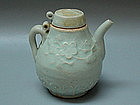 A Yuan Dynasty White Glaze Ewer With Lid