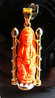 Red coral pendant of Guanyin mounted in 18+ ct. gold