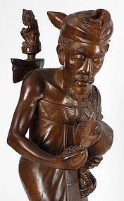 Exceptional Bali Woodcarving: Statue of Man with Cock.