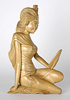 Bali Woodcarving: Statue of a Girl.
