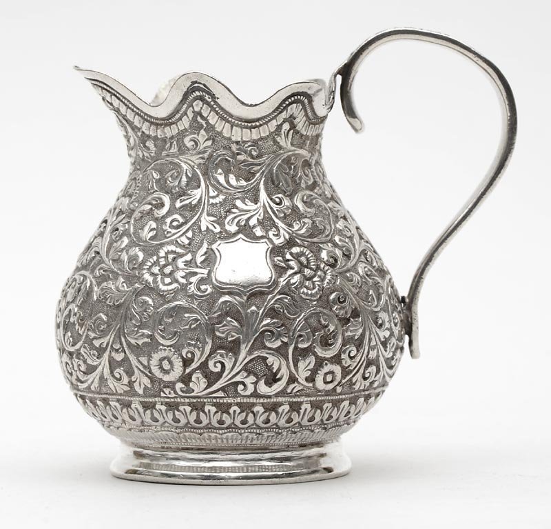 Antique Anglo Indian Repousse Silver Milk Jug.