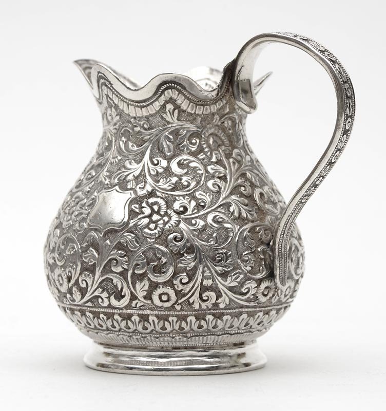 Antique Anglo Indian Repousse Silver Milk Jug.