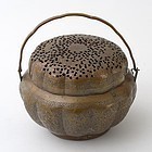 A Chinese Lobed Copper Handwarmer with Openwork, Qing.