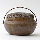 A Chinese Oval Copper Handwarmer with Openwork, Qing.