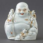 A Chinese Porcelain "Budai & Boys" Figure, 20 th C.