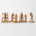 Four Chinese Tushanwan Wood Figurines of Food Marketers, c. 1930.